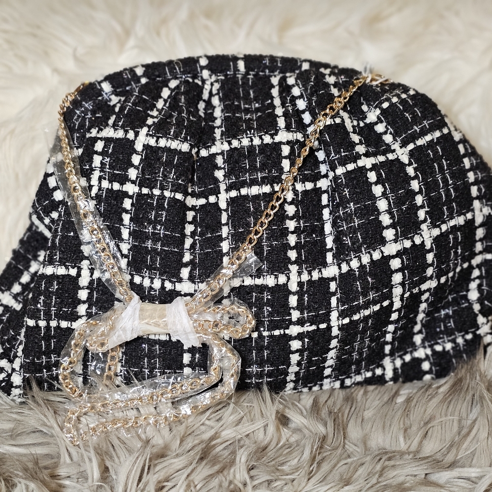 Beautiful blac and white clutch with chain